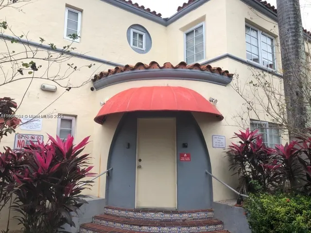 a front view of a house with yard