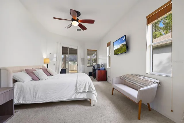 a bedroom with a bed and furniture