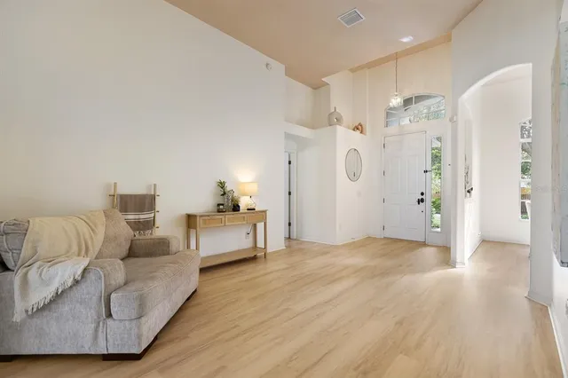 a view of a livingroom with furniture and wooden floor