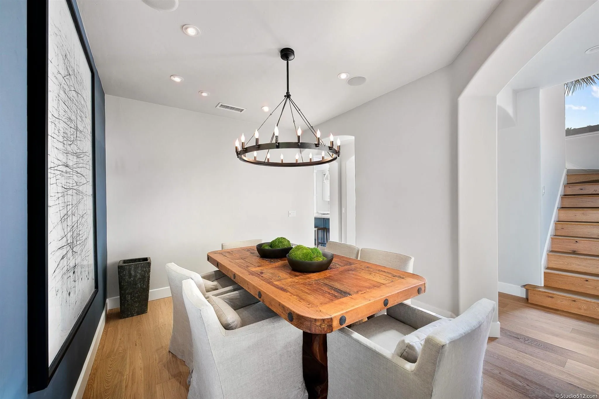 220 Jacob Lane Encinitas, CA 92024 - Photo 11 of 40 a dining room with furniture and wooden floor