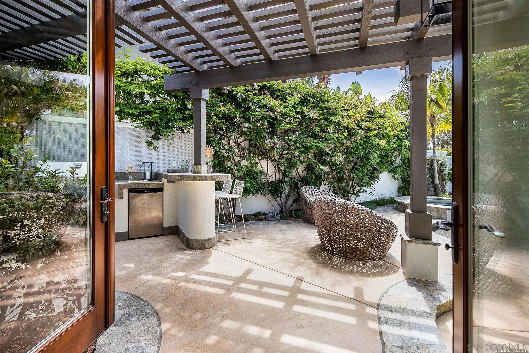 220 Jacob Lane Encinitas, CA 92024 - Photo 12 of 40 a building outdoor space with patio furniture and potted plants