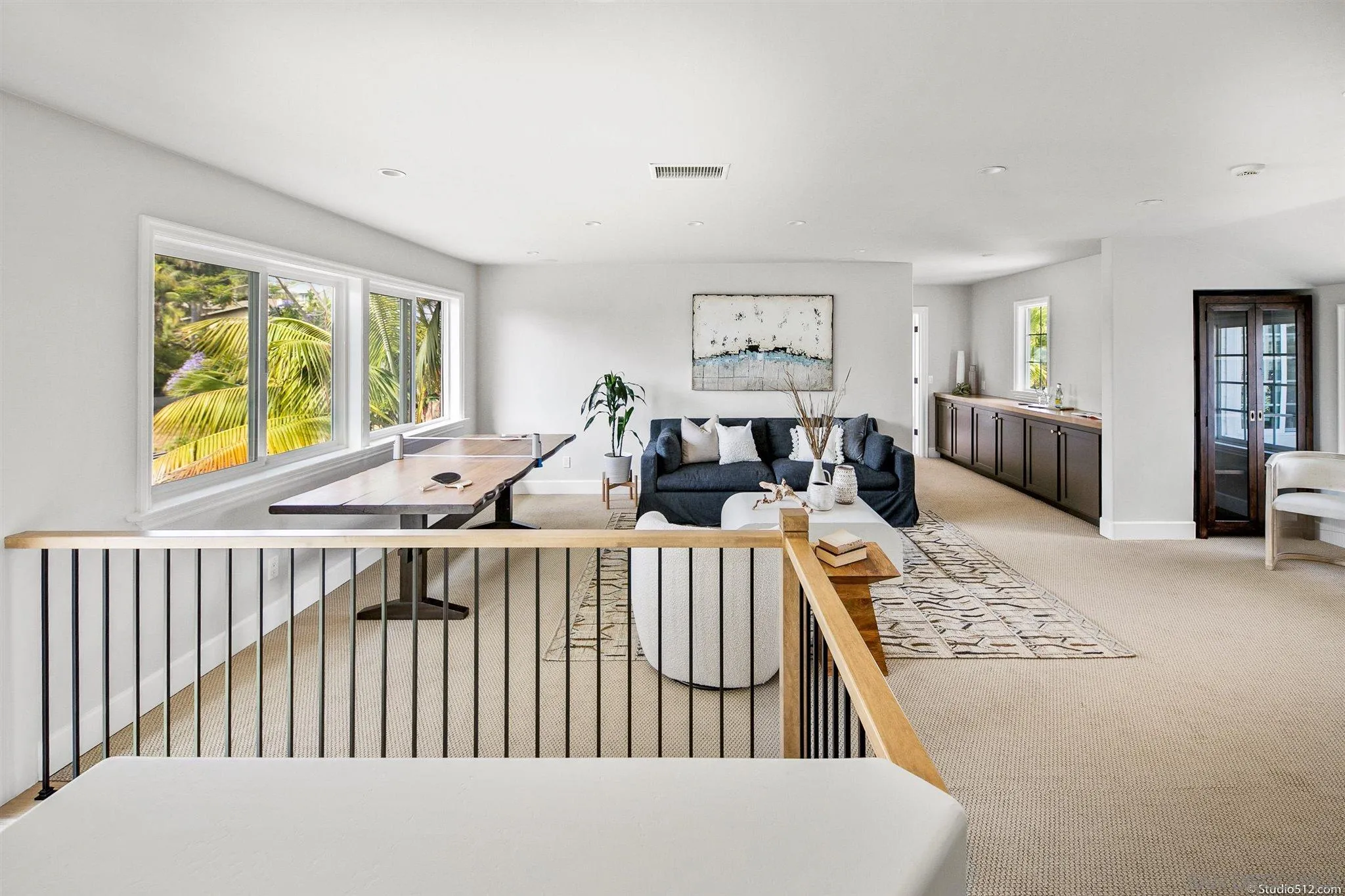 220 Jacob Lane Encinitas, CA 92024 - Photo 28 of 40 a living room with furniture and a table