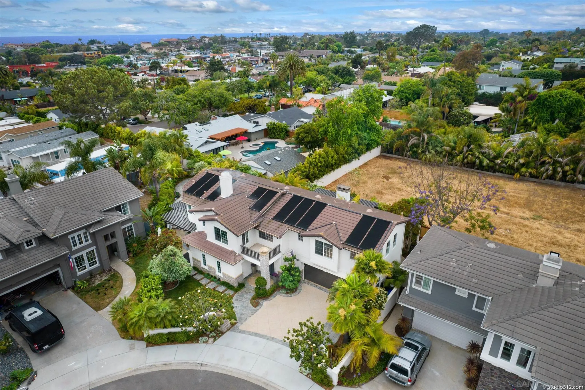 220 Jacob Lane Encinitas, CA 92024 - Photo 34 of 40 an aerial view of a house with a lake view