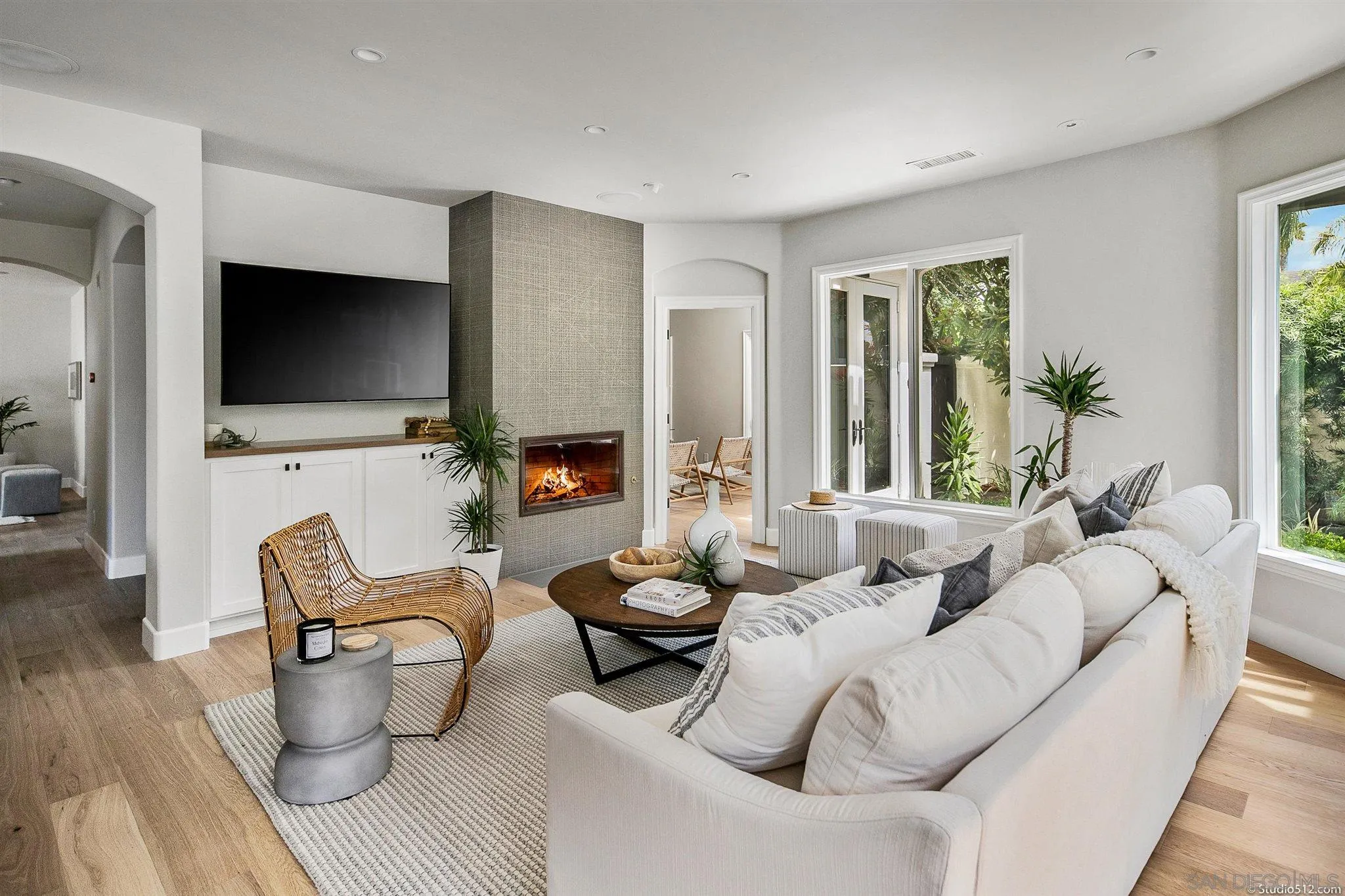 220 Jacob Lane Encinitas, CA 92024 - Photo 4 of 40 a living room with furniture and a flat screen tv