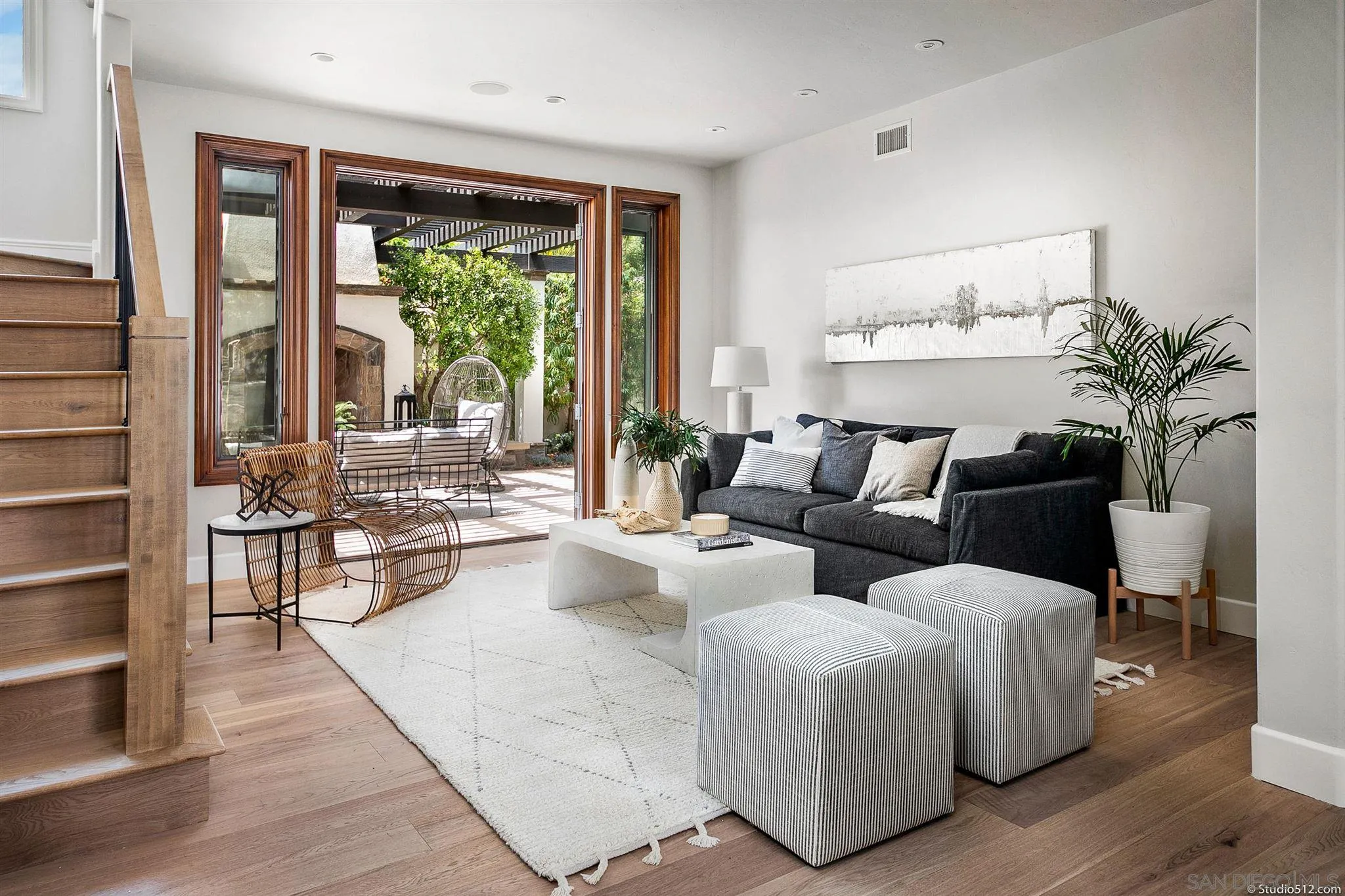 220 Jacob Lane Encinitas, CA 92024 - Photo 9 of 40 a living room with furniture and a large window