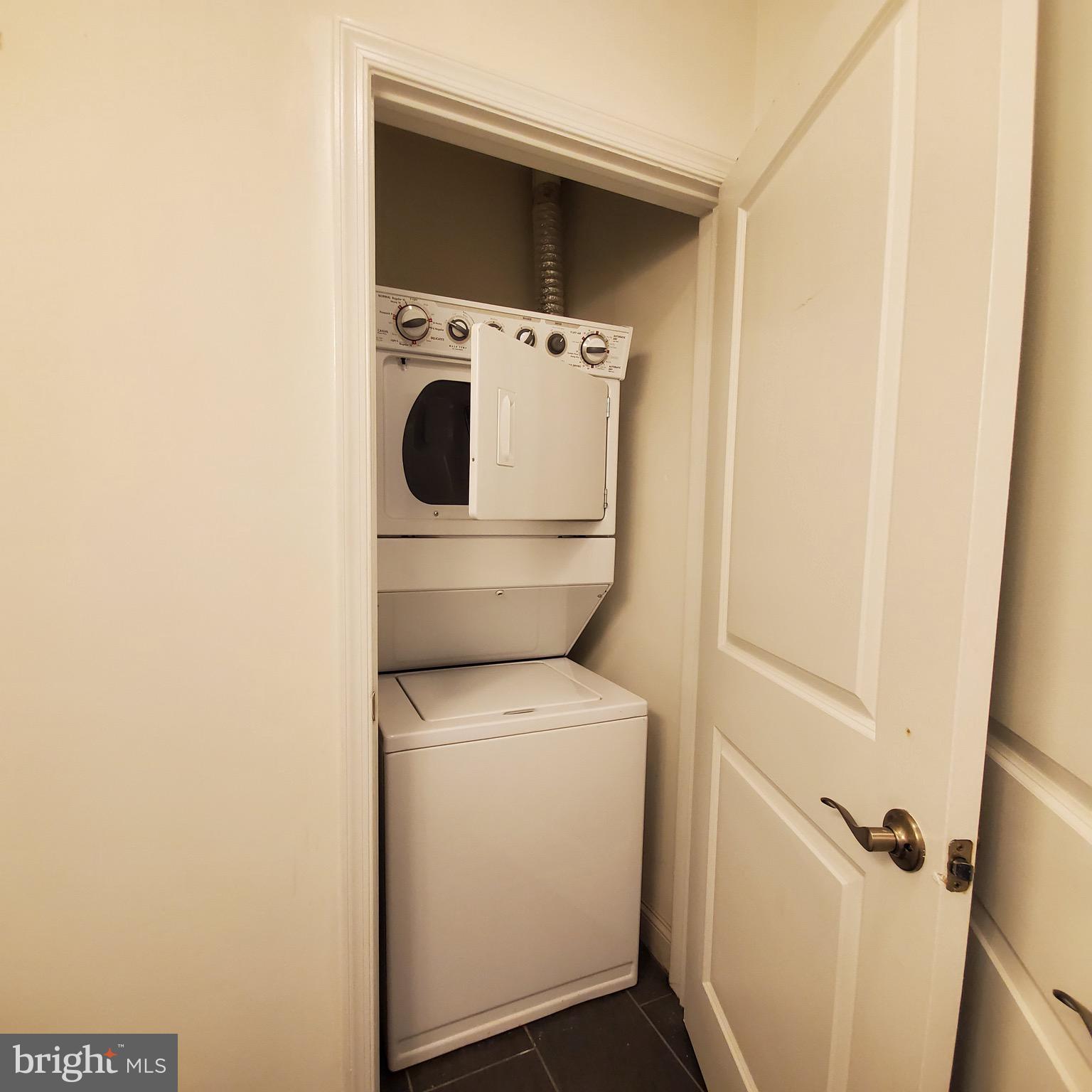 421-429 Monroe Street, Unit 102 Philadelphia, PA 19147 - Photo 8 of 10 a utility room with dryer and washer