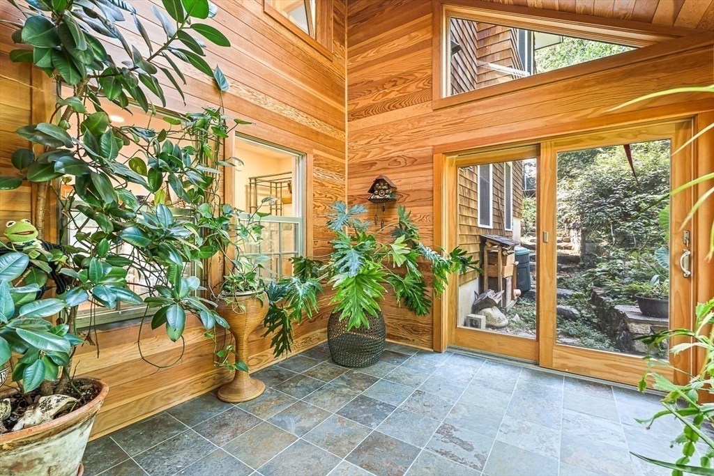 55 Pleasant Street Lexington, MA 02421 - Photo 11 of 42 a view of a pathway along with potted plants