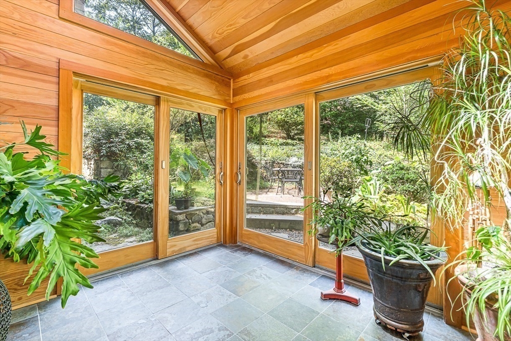 55 Pleasant Street Lexington, MA 02421 - Photo 12 of 42 a house with trees in front of it