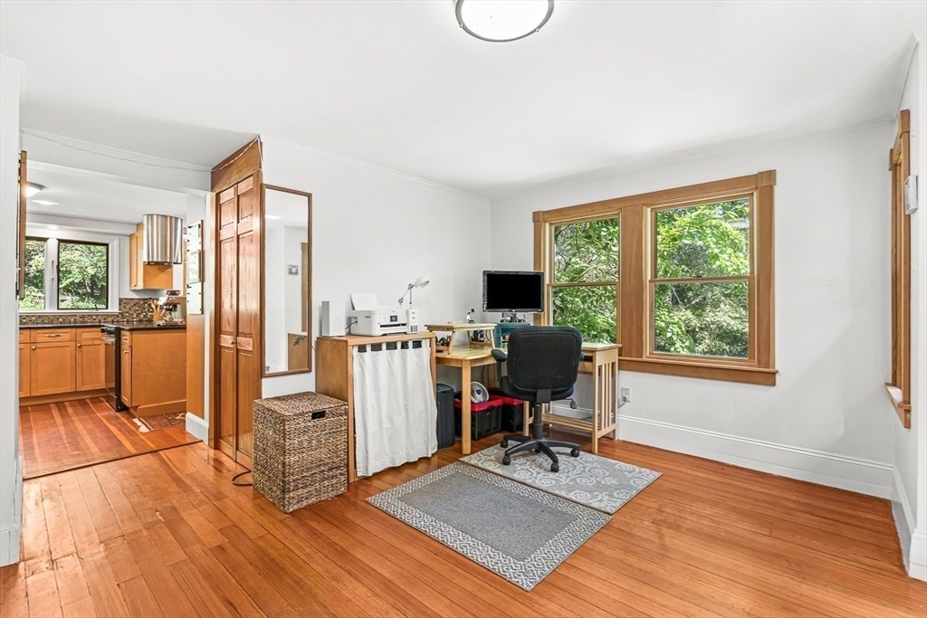 55 Pleasant Street Lexington, MA 02421 - Photo 18 of 42 a view of a workspace with furniture and a window