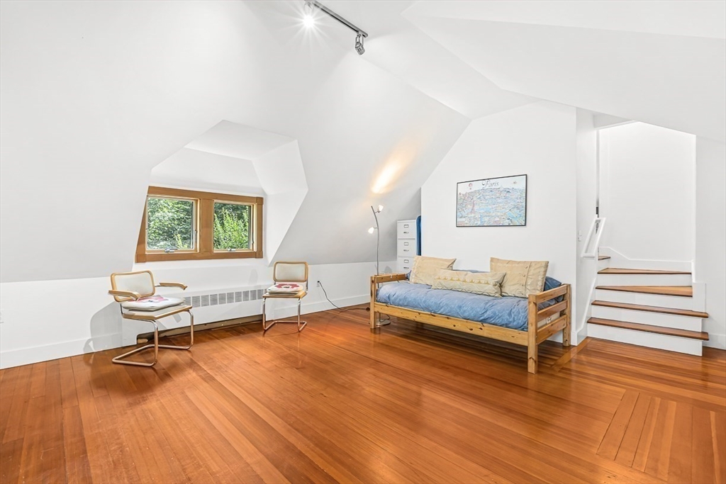 55 Pleasant Street Lexington, MA 02421 - Photo 29 of 42 a living room with furniture and a wooden floor