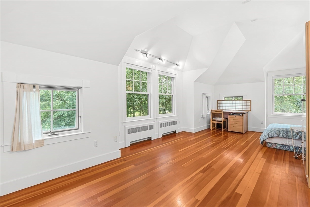 55 Pleasant Street Lexington, MA 02421 - Photo 34 of 42 a living room with furniture and a window