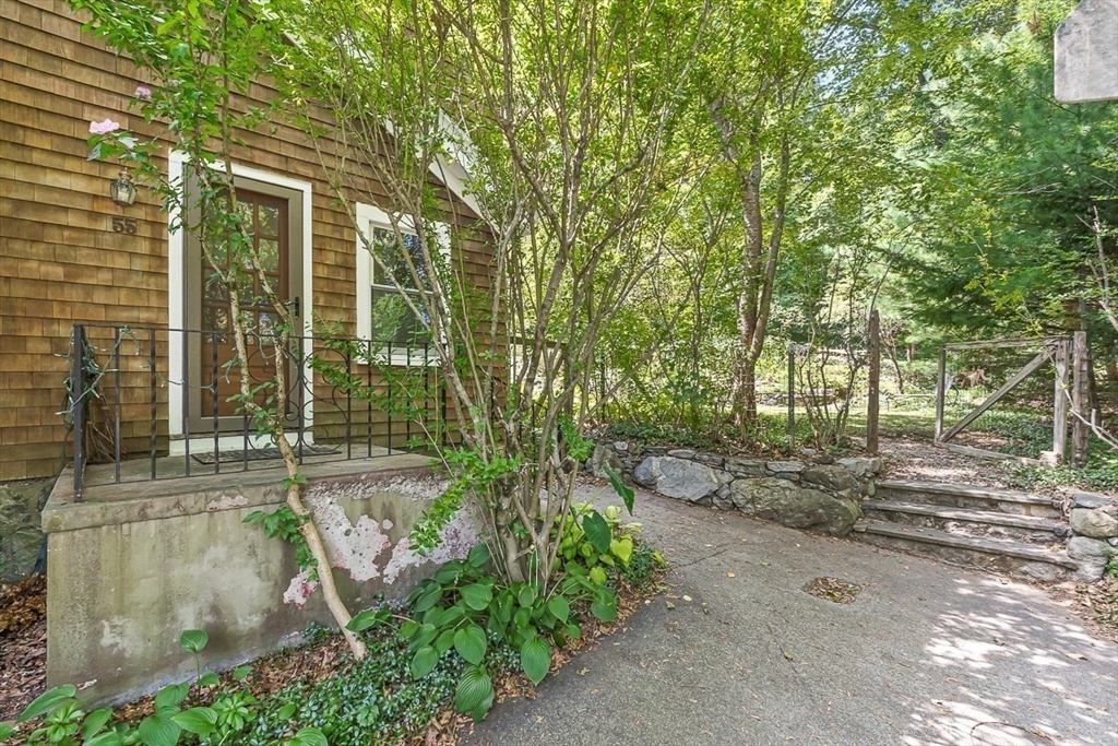 55 Pleasant Street Lexington, MA 02421 - Photo 36 of 42 a view of a backyard