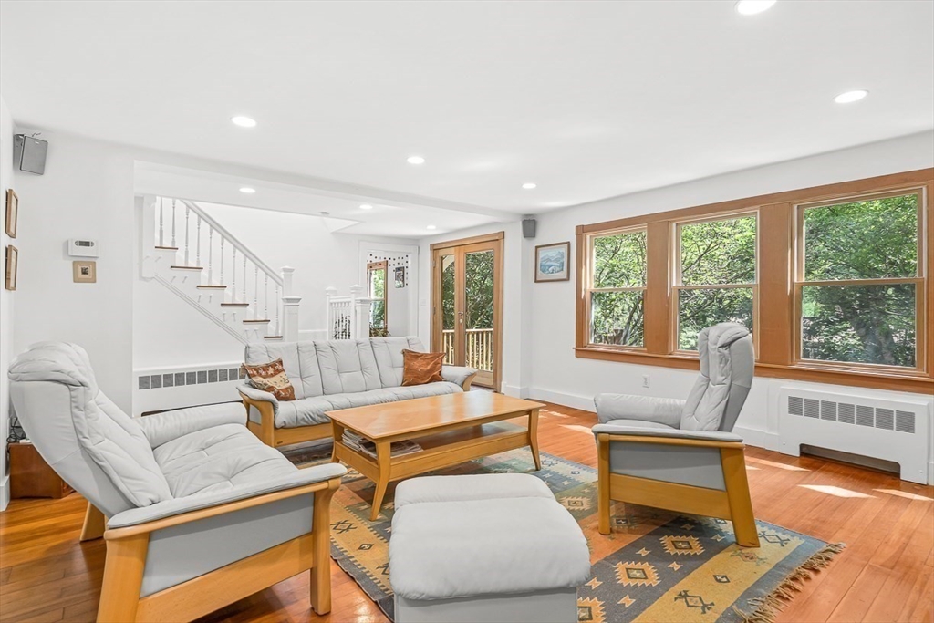 55 Pleasant Street Lexington, MA 02421 - Photo 6 of 42 a living room with furniture and a large window