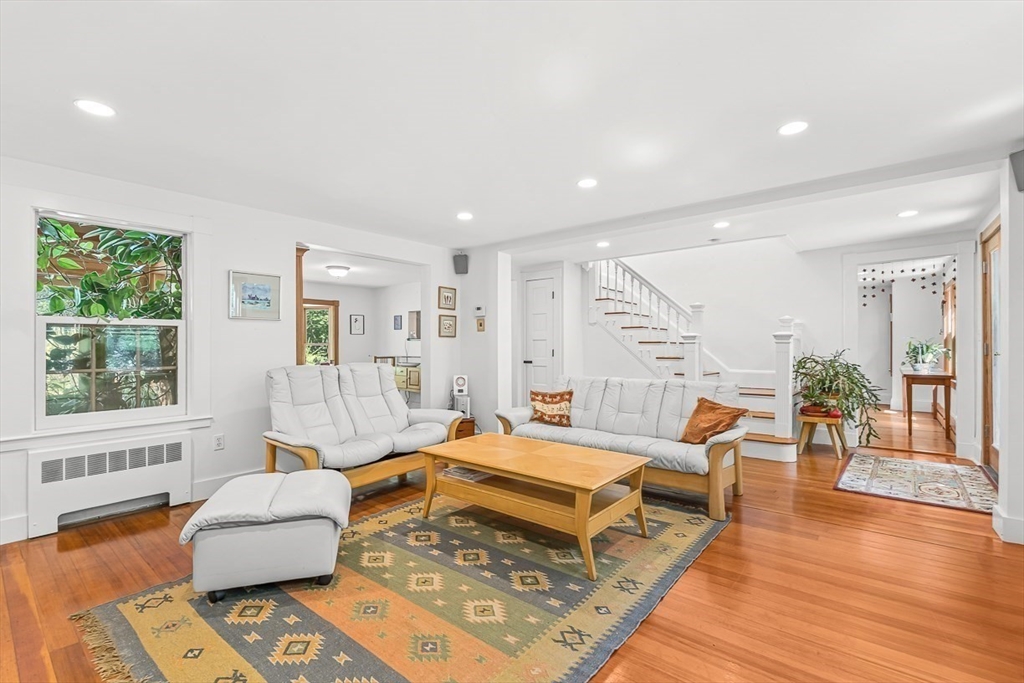 55 Pleasant Street Lexington, MA 02421 - Photo 7 of 42 a living room with furniture and wooden floor