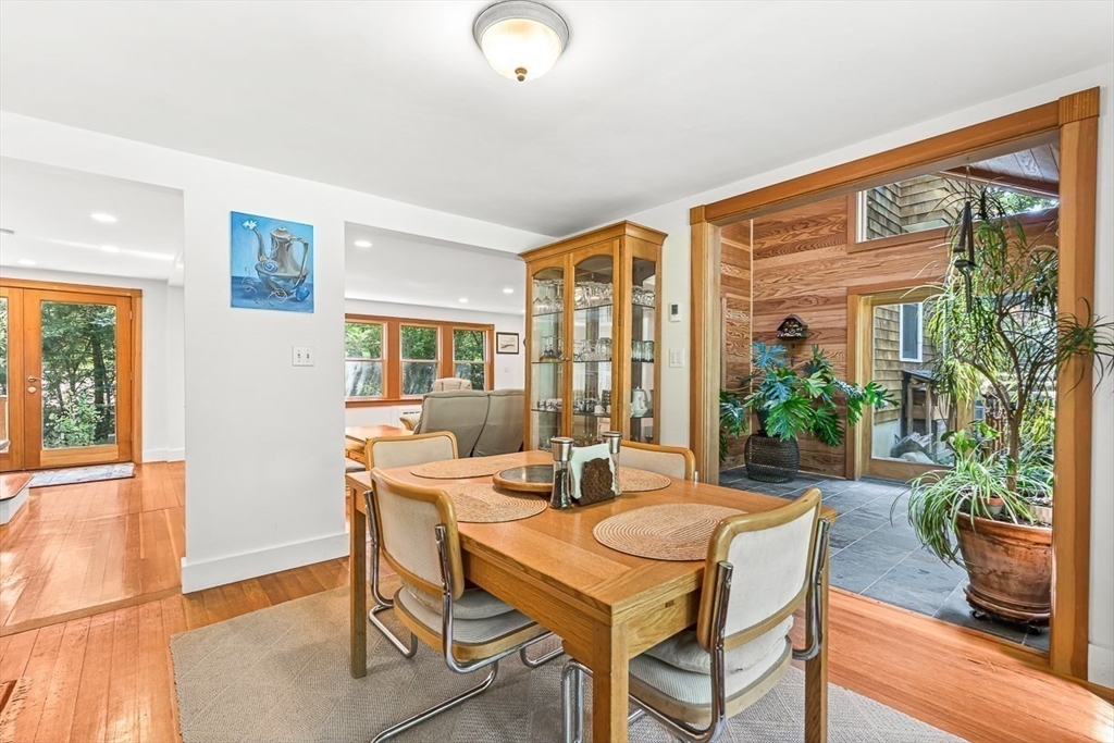 55 Pleasant Street Lexington, MA 02421 - Photo 9 of 42 a dining room with furniture window and wooden floor