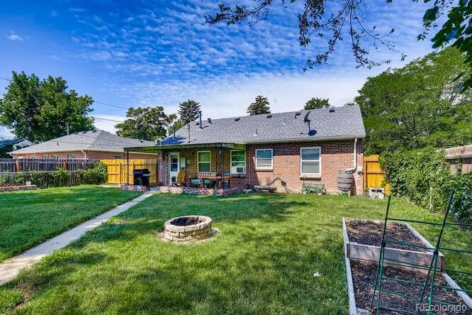 3880 Quay Street Wheat Ridge, CO 80033 - Photo 27 of 32 a view of house with garden
