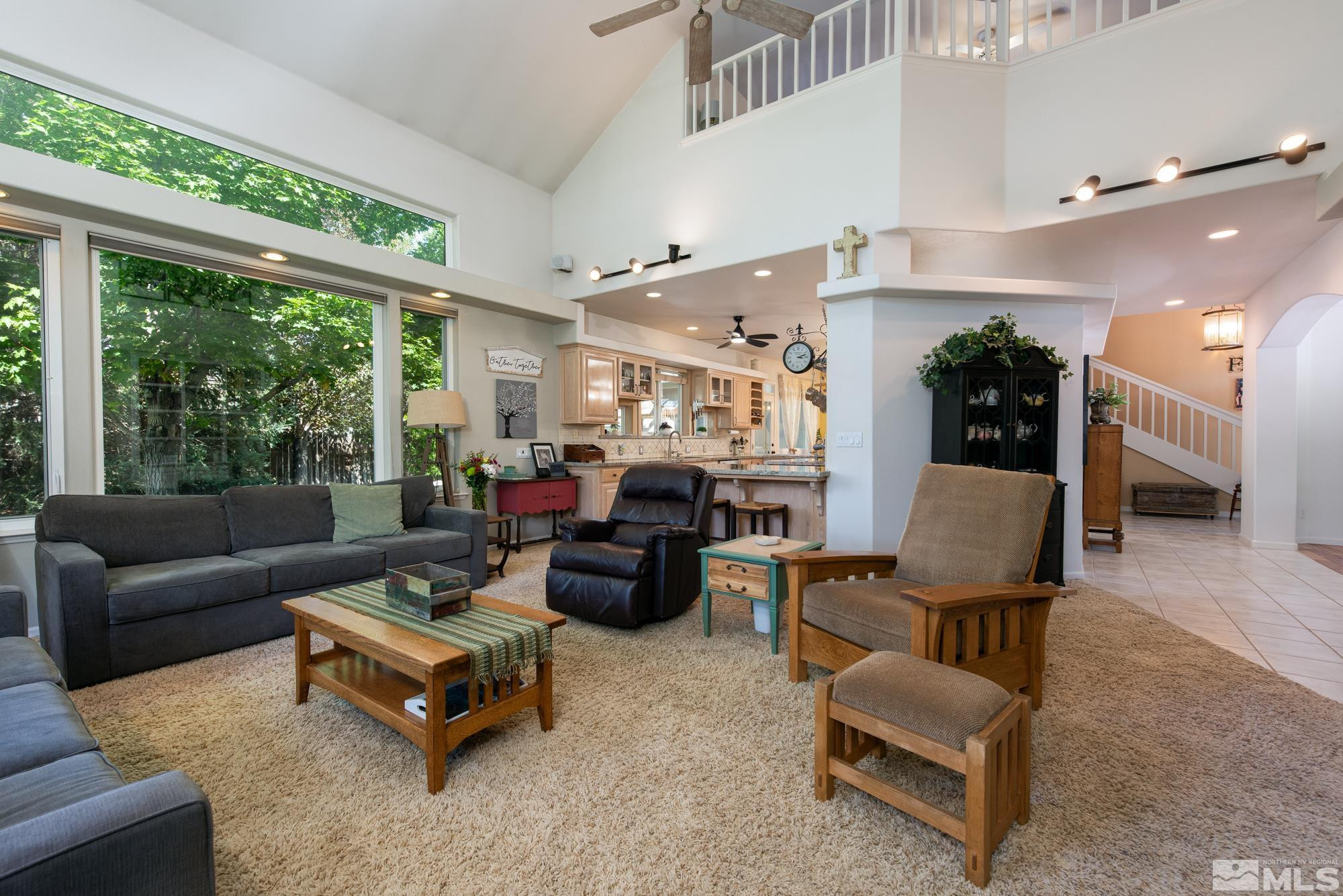 971 Fieldgate Way Gardnerville, NV 89460 - Photo 11 of 57 a living room with furniture and a large window