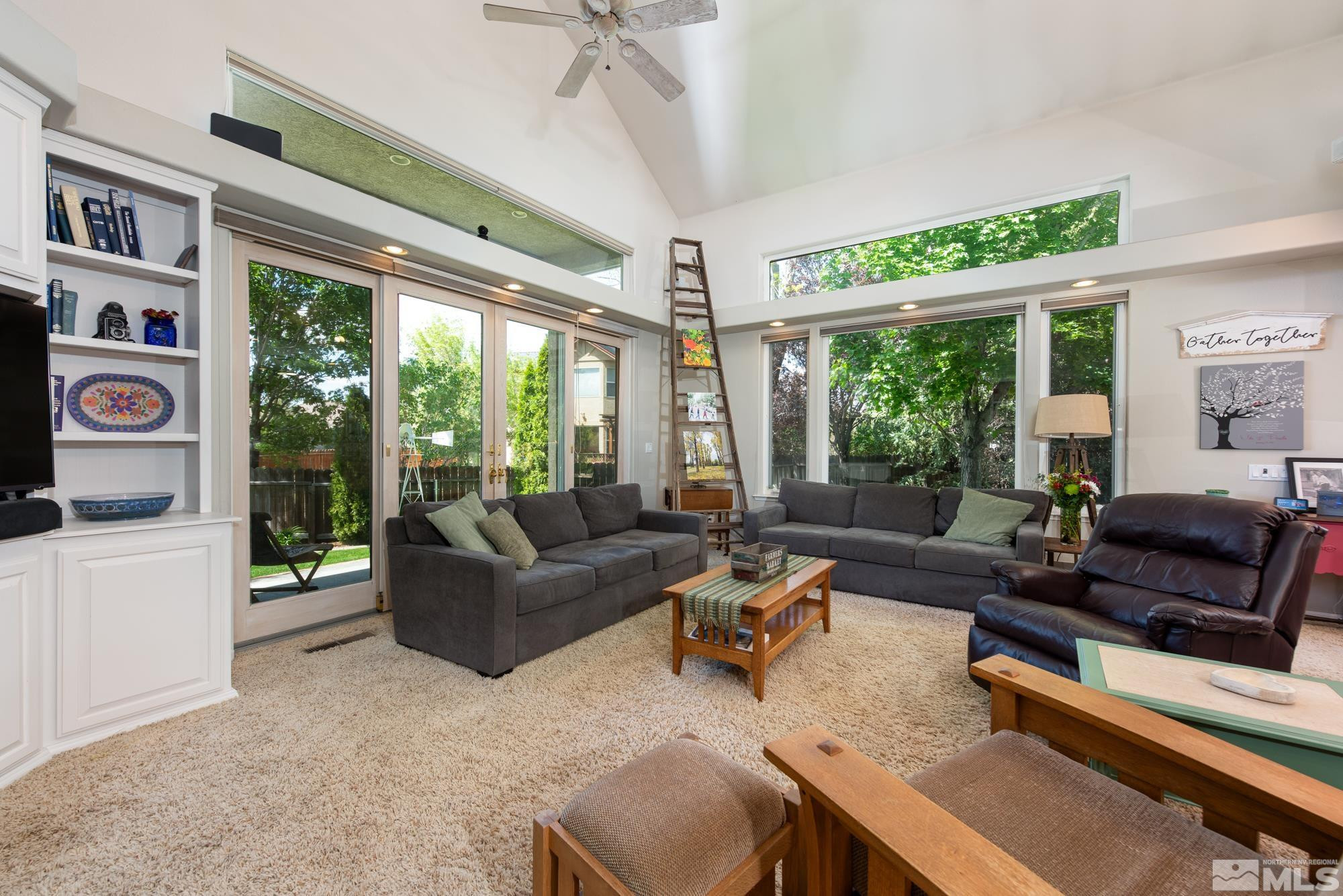 971 Fieldgate Way Gardnerville, NV 89460 - Photo 12 of 57 a living room with furniture and a large window