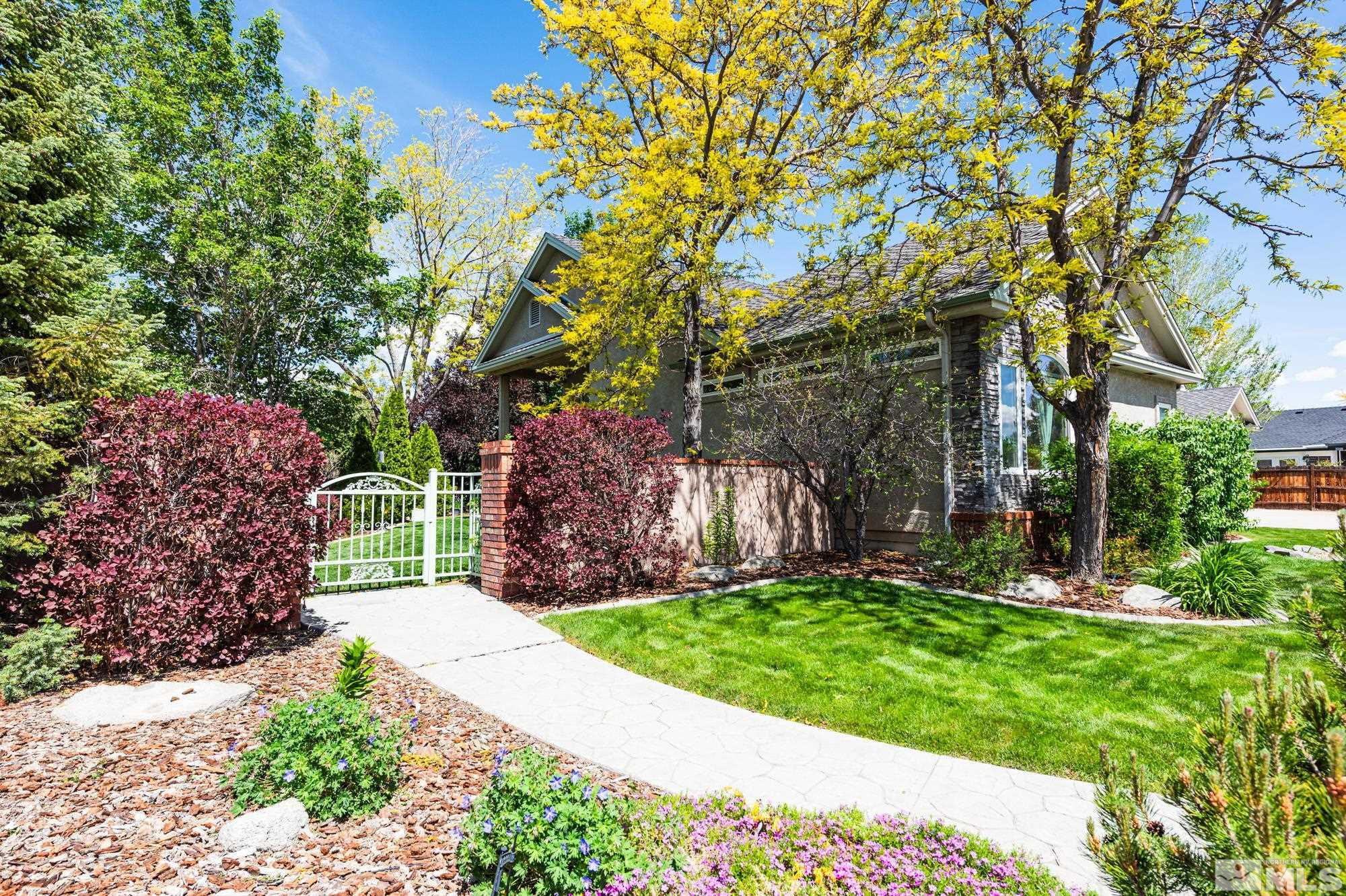 971 Fieldgate Way Gardnerville, NV 89460 - Photo 30 of 57 a view of a garden with large trees