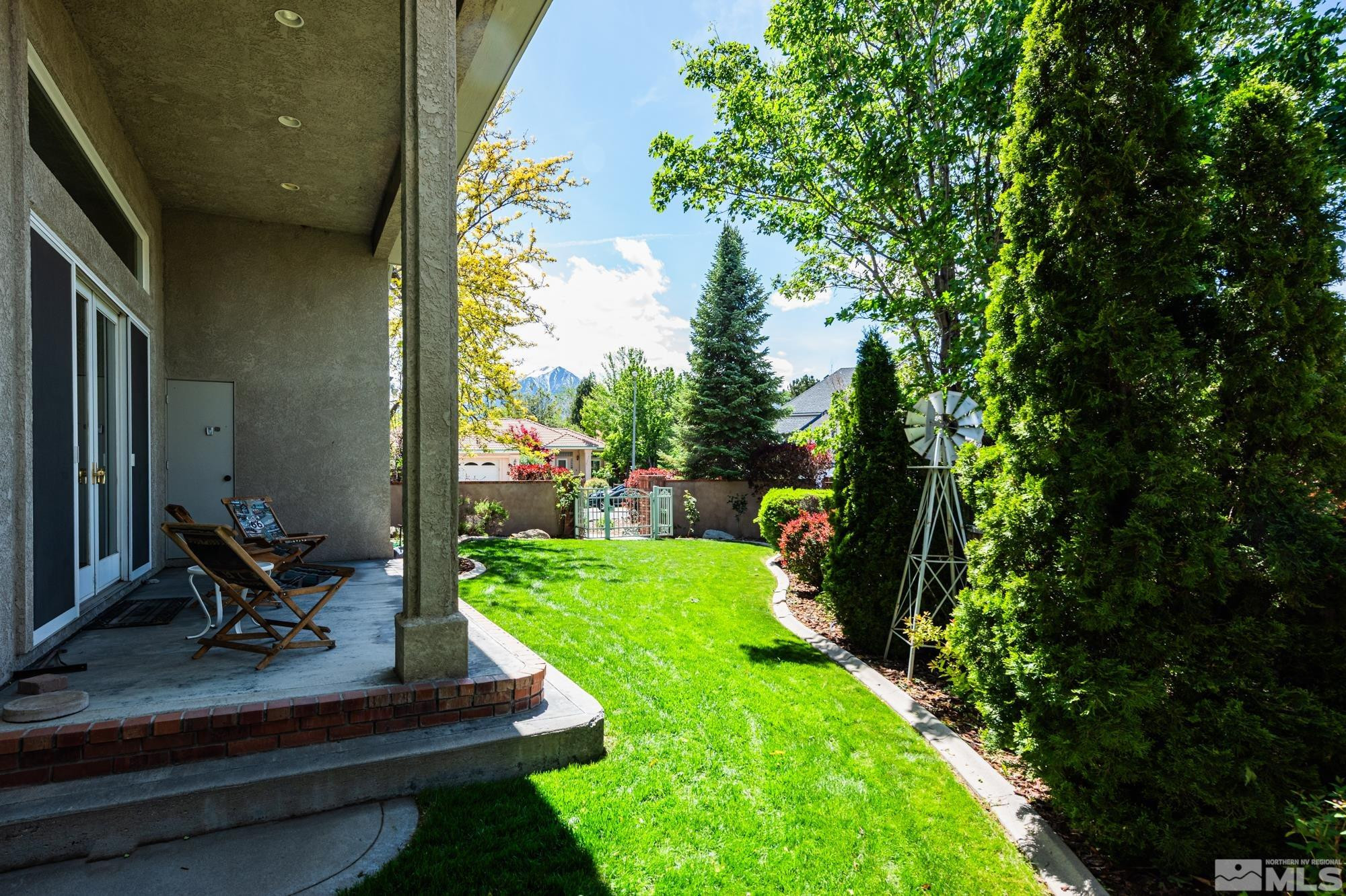 971 Fieldgate Way Gardnerville, NV 89460 - Photo 35 of 57 a view of backyard with hardwood