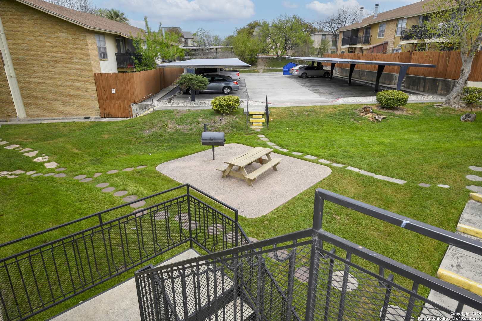 911 Vance Jackson Road, Unit 212 San Antonio, TX 78201 - Photo 23 of 30 a view of a patio with chairs