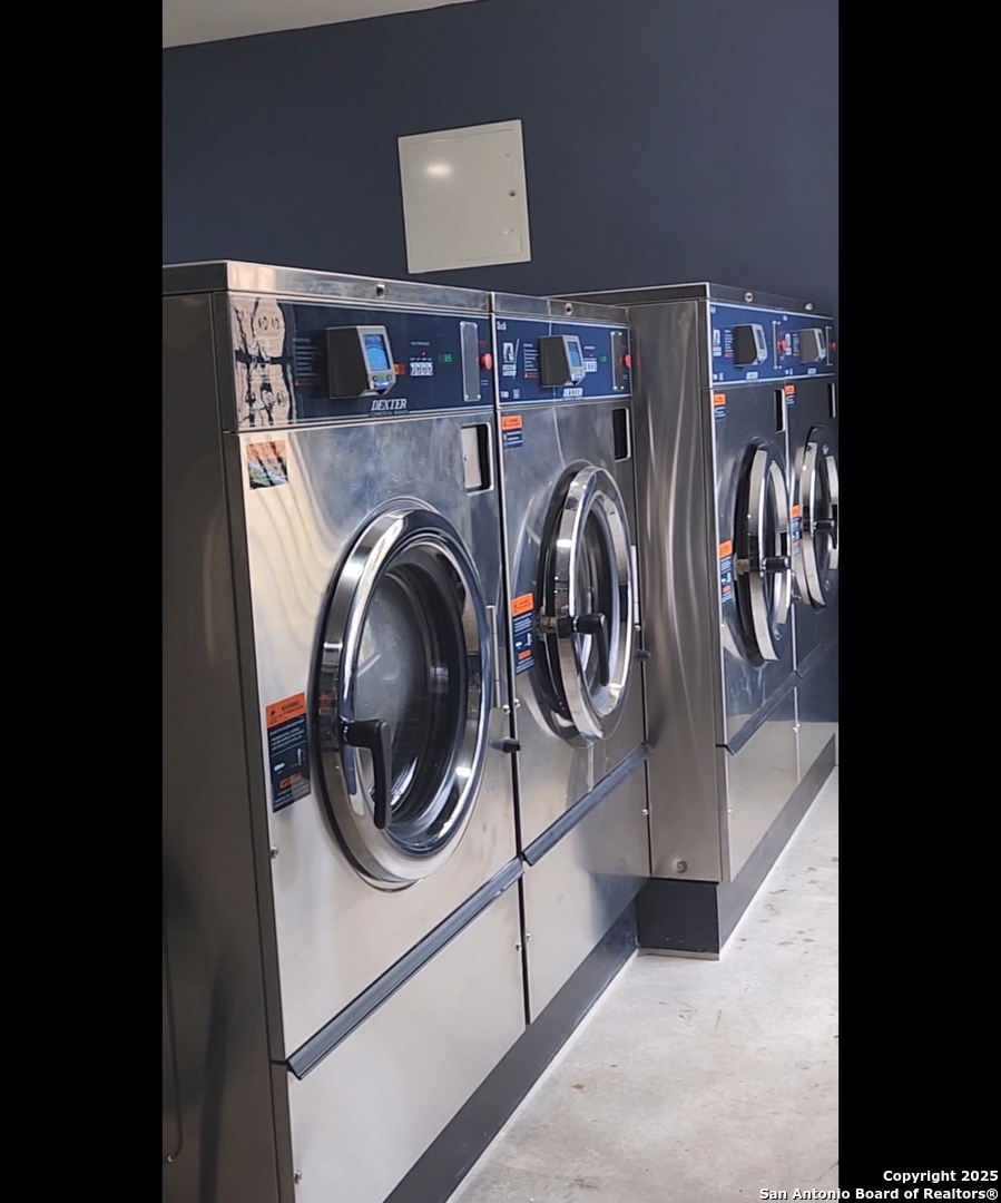 911 Vance Jackson Road, Unit 212 San Antonio, TX 78201 - Photo 27 of 30 a utility room with dryer and washer