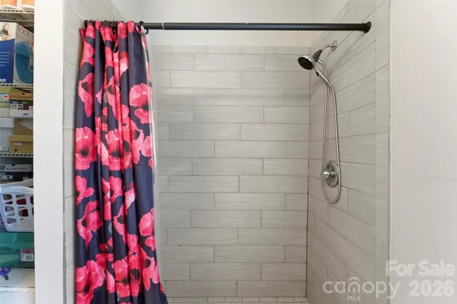 a bathroom with a sink a mirror and a toilet