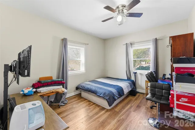 a workspace with furniture and wooden floor
