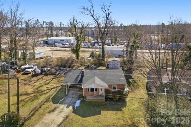 a view of residential houses with outdoor space