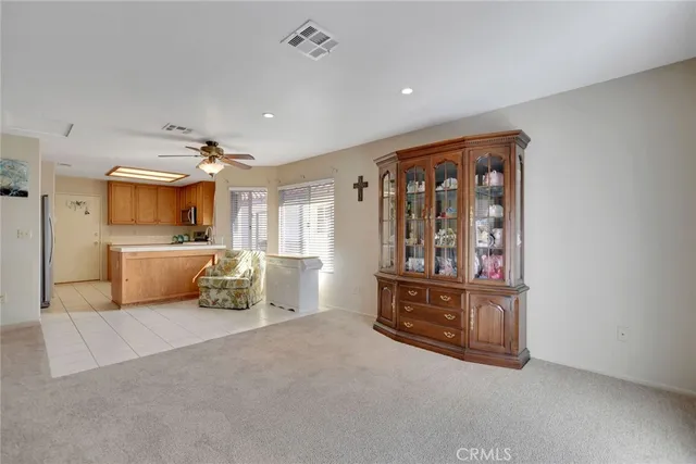 a large room with a large bed and furniture