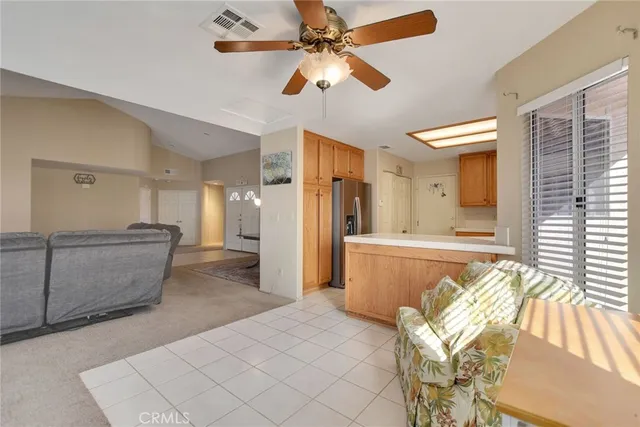 a view of a livingroom with furniture and chandelier