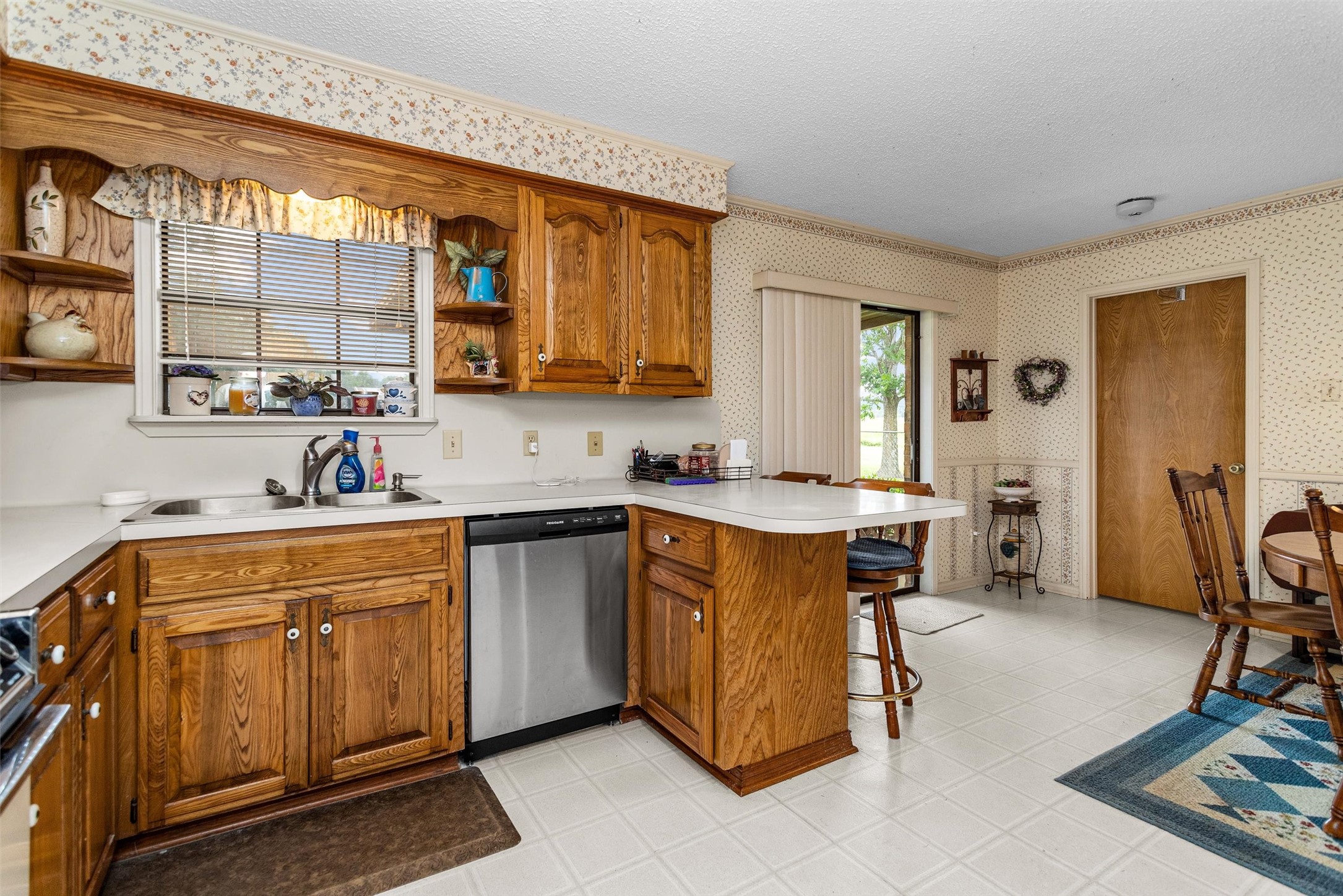 3219 Fm 1817 Elkhart, TX 75839 - Photo 11 of 31 a kitchen with a sink cabinets and window