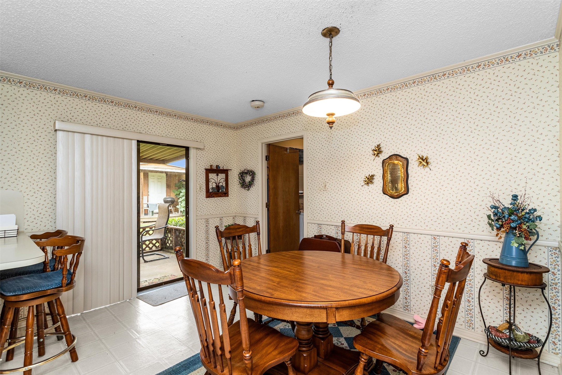 3219 Fm 1817 Elkhart, TX 75839 - Photo 15 of 31 a dining room with furniture a chandelier and wooden floor