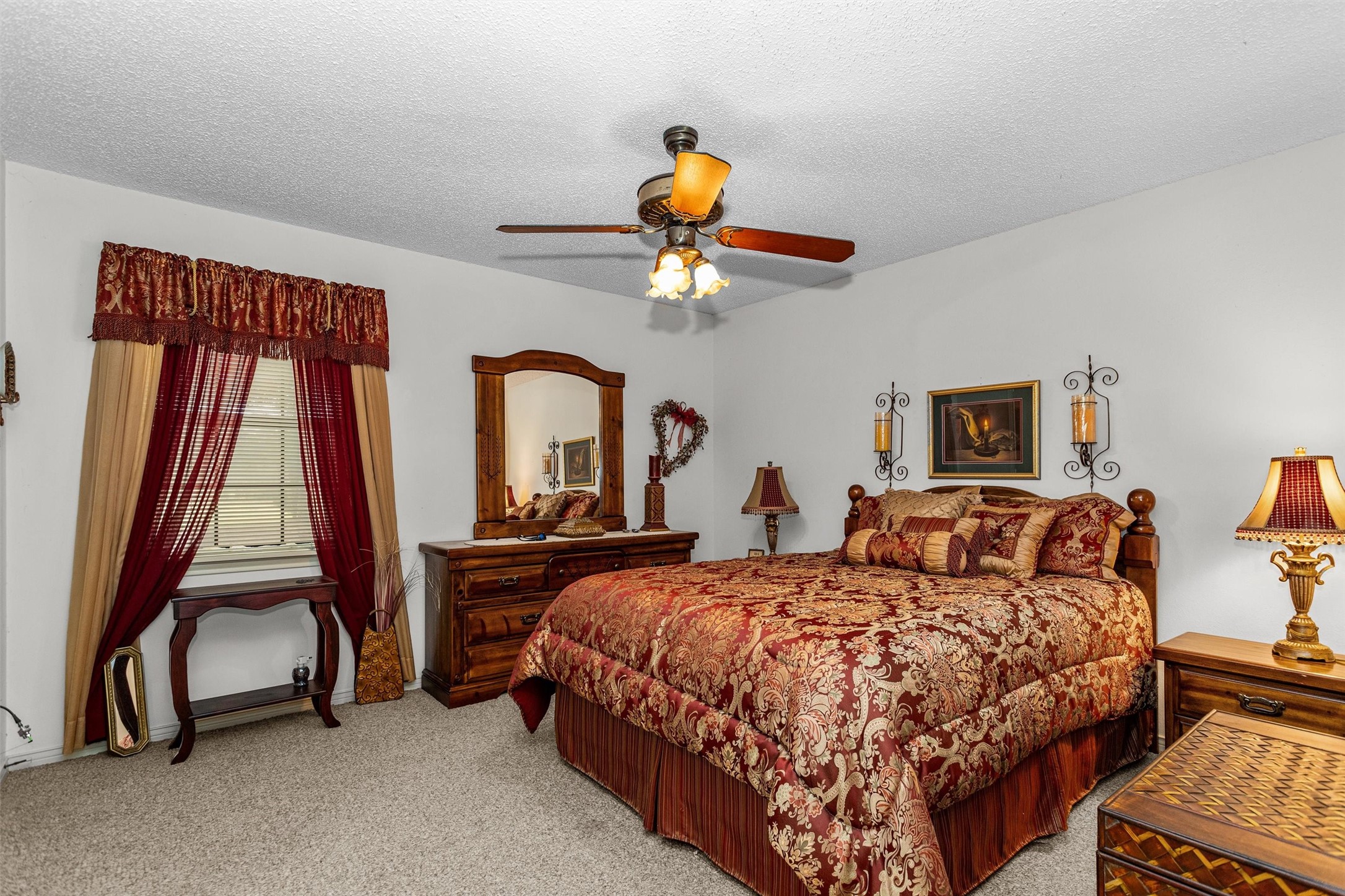 3219 Fm 1817 Elkhart, TX 75839 - Photo 16 of 31 a bedroom with a bed and a chandelier