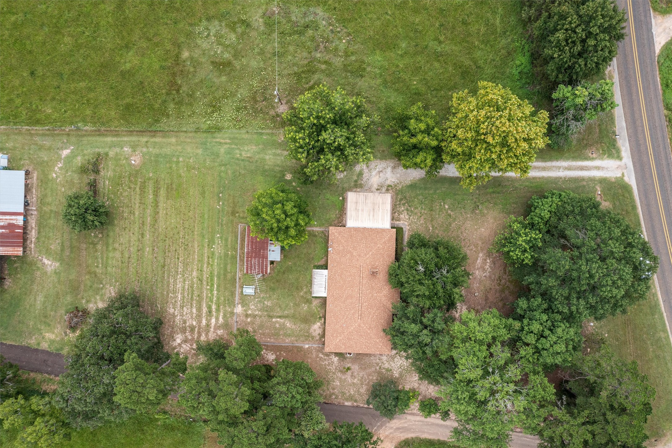 3219 Fm 1817 Elkhart, TX 75839 - Photo 27 of 31 an aerial view of residential house with outdoor space and trees around