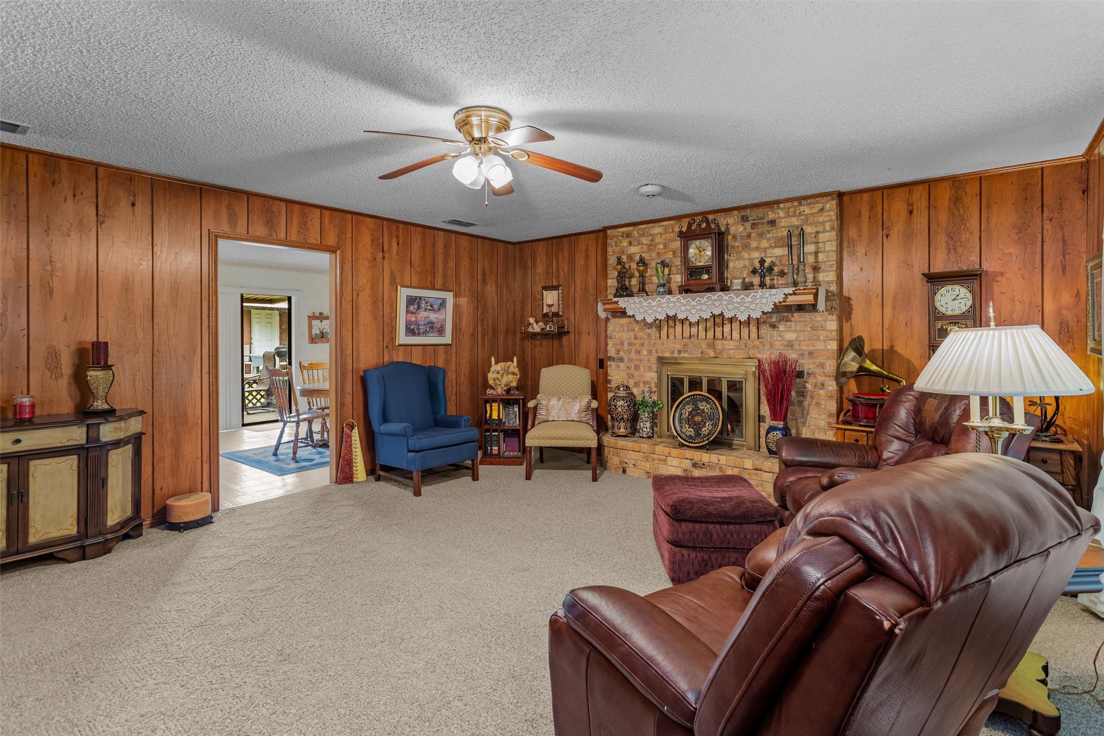 3219 Fm 1817 Elkhart, TX 75839 - Photo 7 of 31 a living room with furniture and a chandelier