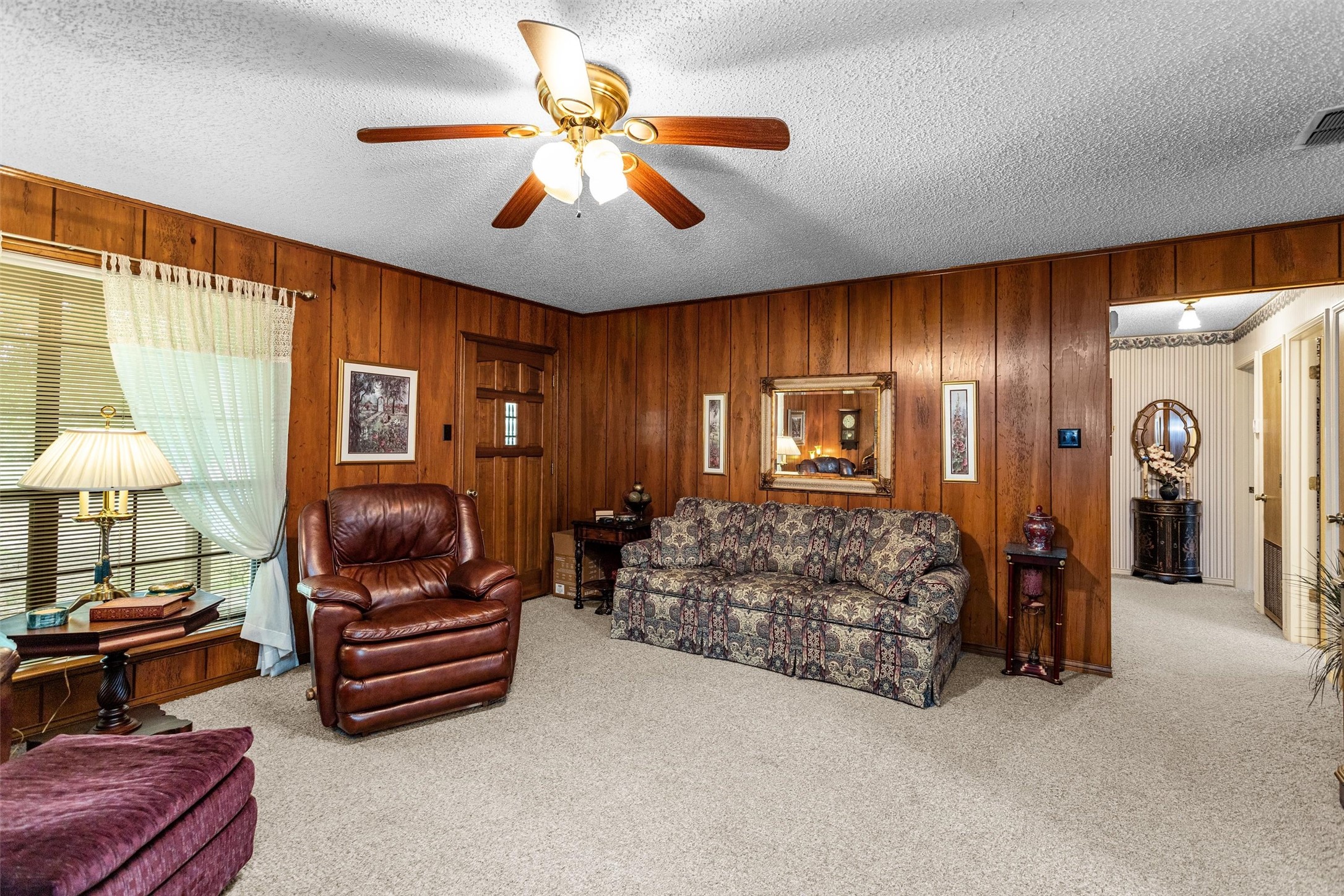 3219 Fm 1817 Elkhart, TX 75839 - Photo 8 of 31 a bedroom with furniture and a chandelier