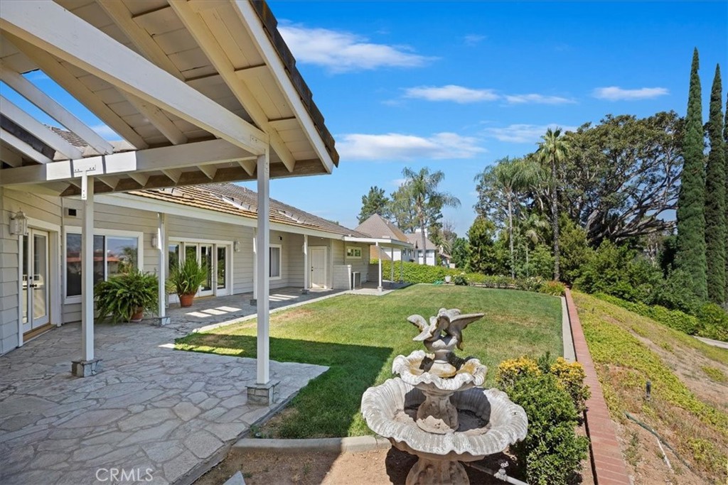 1507 Weston Way Riverside, CA 92506 - Photo 46 of 55 a view of a house with backyard and a patio