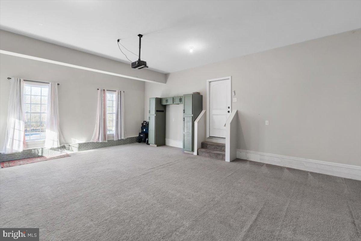 441 Shady Creek Road Clear Brook, VA 22624 - Photo 12 of 46 a view of empty room with windows