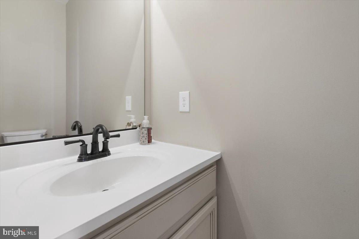 441 Shady Creek Road Clear Brook, VA 22624 - Photo 14 of 46 a bathroom with a sink and a mirror