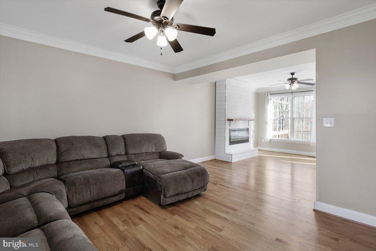 441 Shady Creek Road Clear Brook, VA 22624 - Photo 19 of 46 a living room with furniture and a large window