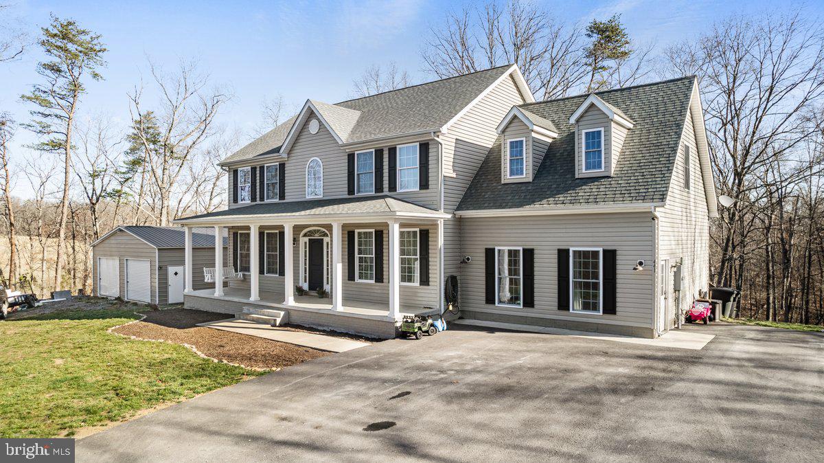 441 Shady Creek Road Clear Brook, VA 22624 - Photo 2 of 46 a front view of a house with a yard