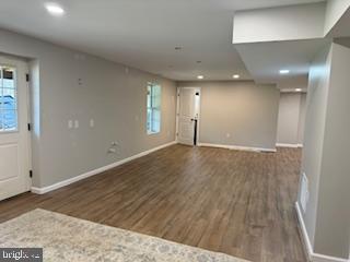 441 Shady Creek Road Clear Brook, VA 22624 - Photo 41 of 46 an empty room with wooden floor and windows