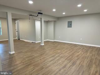 441 Shady Creek Road Clear Brook, VA 22624 - Photo 42 of 46 an empty room with wooden floor and windows