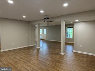 441 Shady Creek Road Clear Brook, VA 22624 - Photo 44 of 46 an empty room with wooden floor and windows
