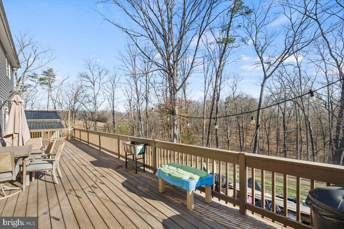 441 Shady Creek Road Clear Brook, VA 22624 - Photo 10 of 46 a view of balcony with wooden floor and fence
