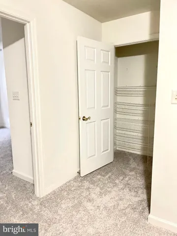 a view of a bathroom with a tub and sink