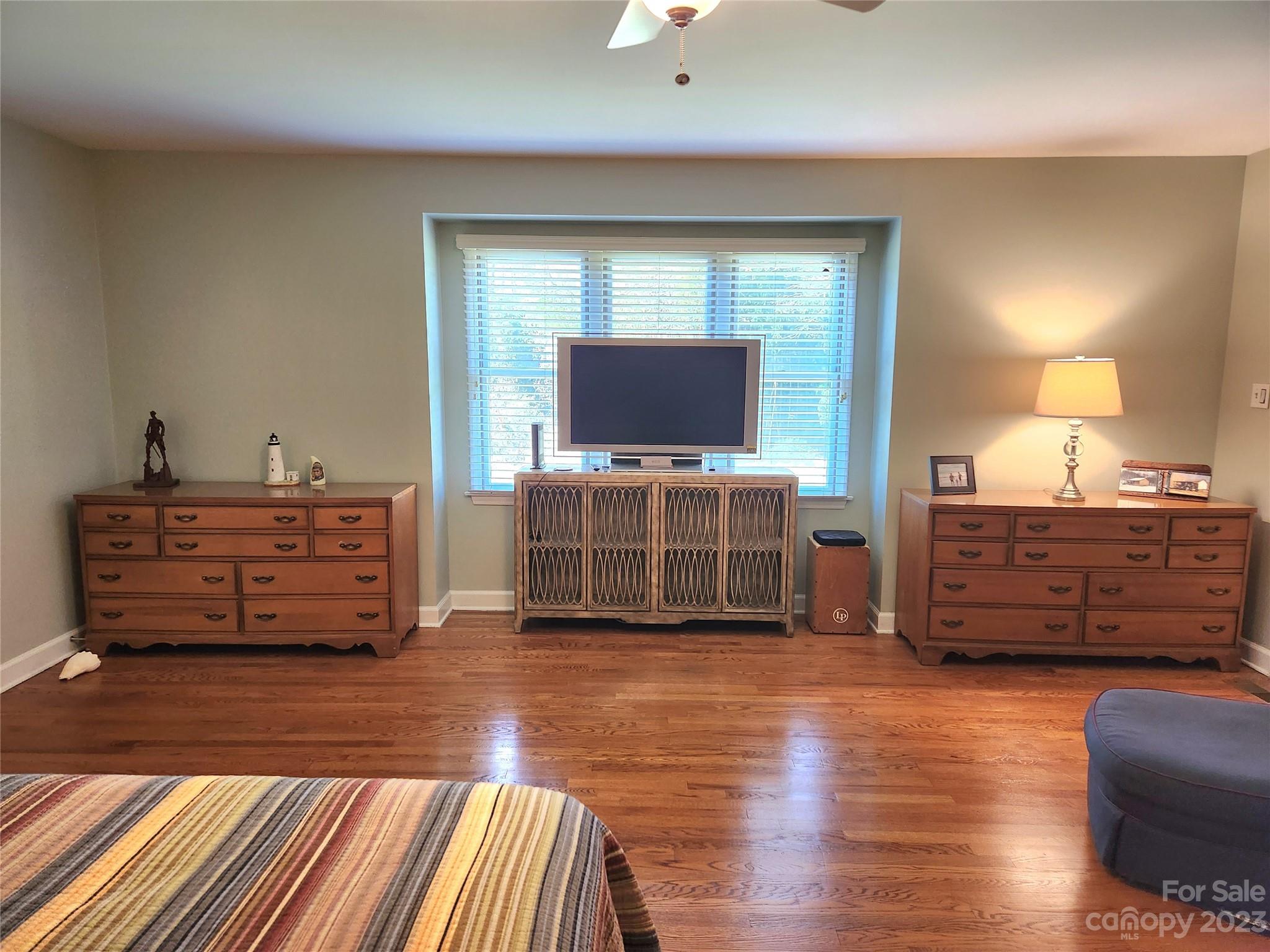 1101 Running Brook Road Midland, NC 28107 - Photo 17 of 48 a living room with furniture and a flat screen tv