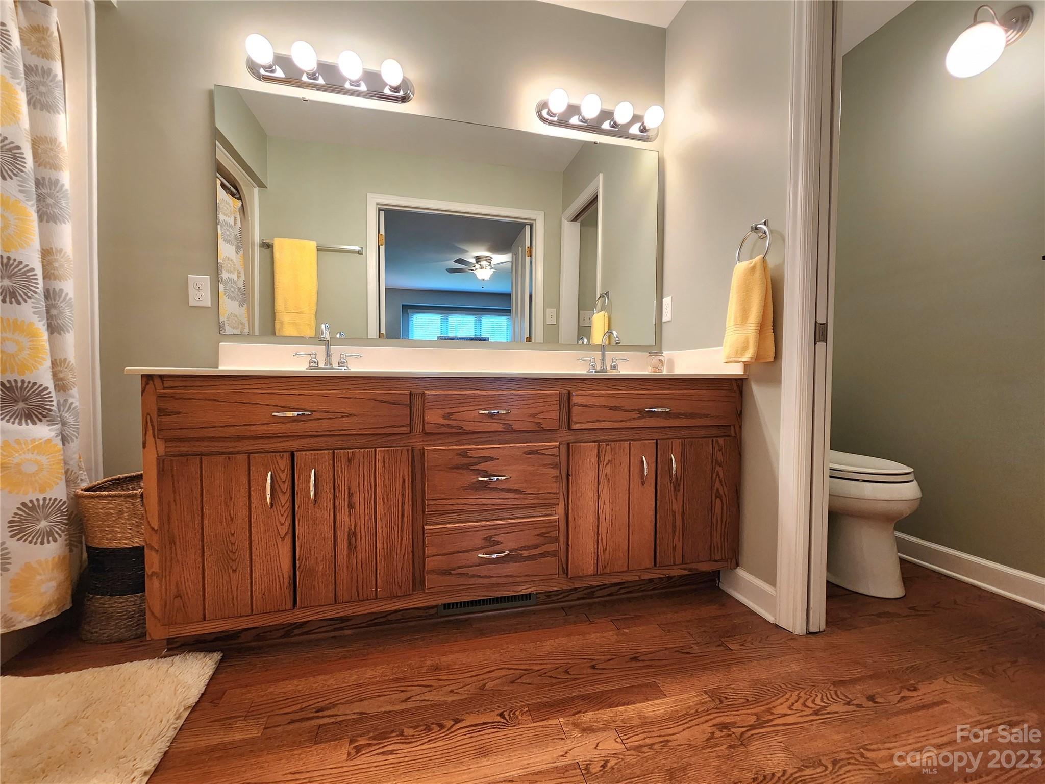 1101 Running Brook Road Midland, NC 28107 - Photo 18 of 48 a spacious bathroom with a granite countertop sink and a mirror