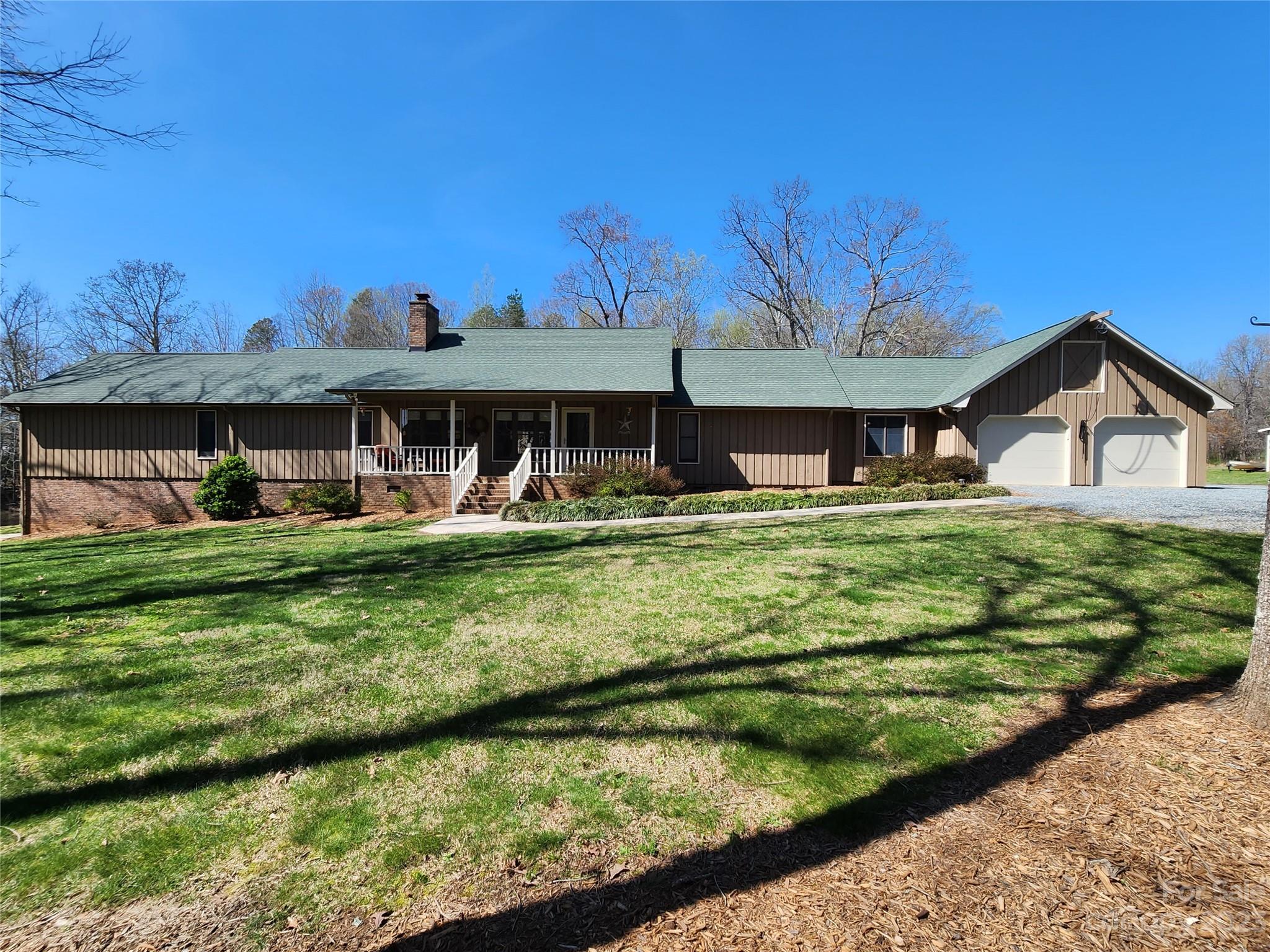 1101 Running Brook Road Midland, NC 28107 - Photo 2 of 48 a front view of a house with garden